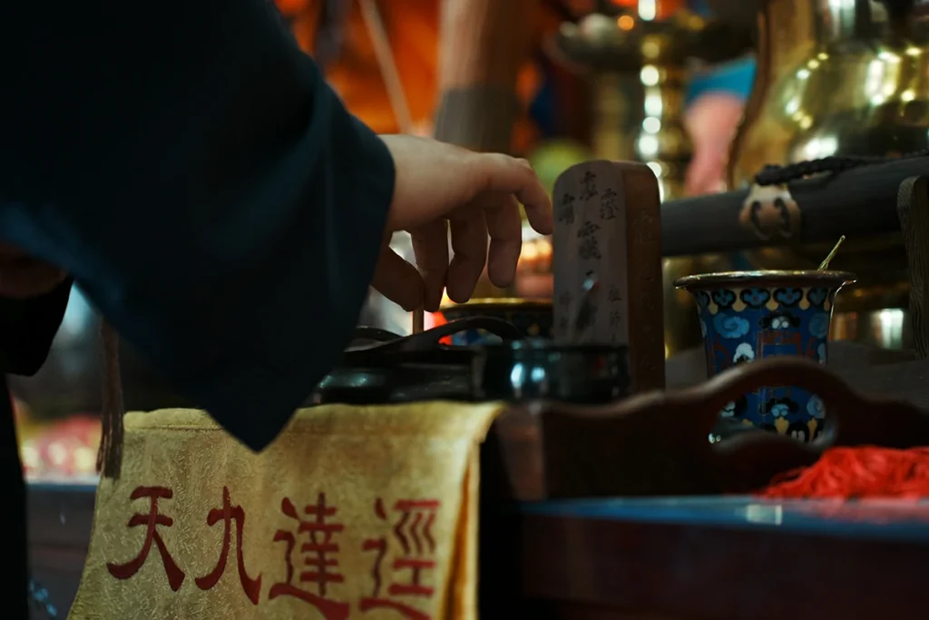 Taoist ritual tablet and altar detail during blessing ceremony