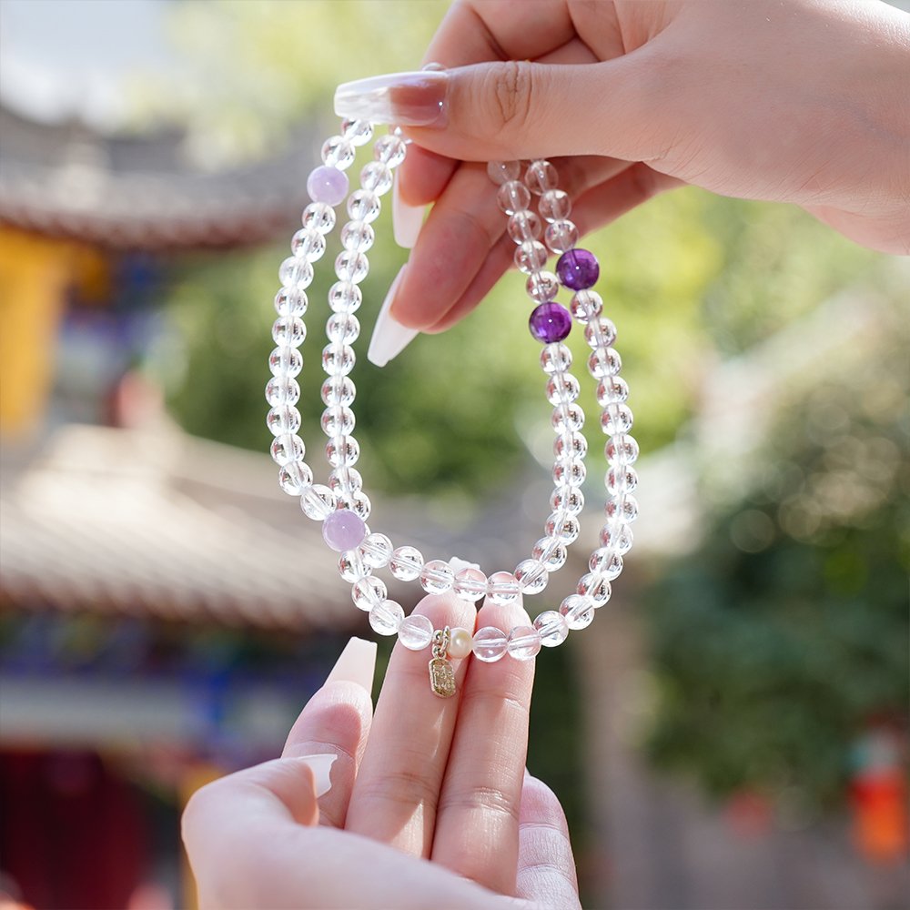 clear quartz amethyst bracelet,clear thinking crystal bracelet,minimalist crystal bracelet,white crystal purple crystal bracelet,amethyst bracelet for daily wear,clear quartz bracelet,shell pearl crystal bracelet,symbolic cleansing bracelet,focus symbolism bracelet,TS-209 bracelet