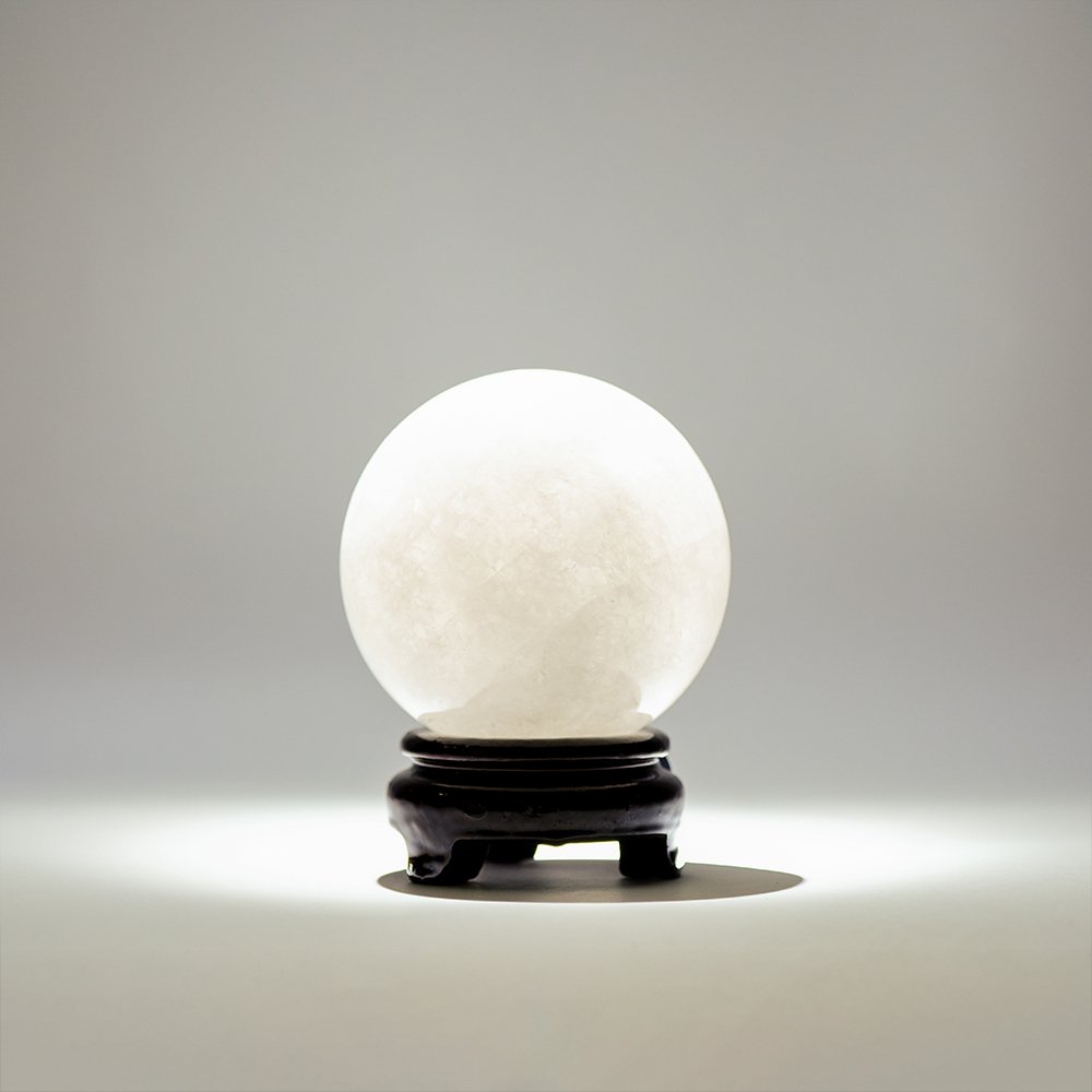 small clear quartz sphere,clear crystal ball,white crystal sphere,clear quartz desk decor,clarity crystal decor,wisdom inspired crystal sphere,symbolic cleansing decor,study desk crystal ball,home office crystal decor,TS-4052 crystal sphere